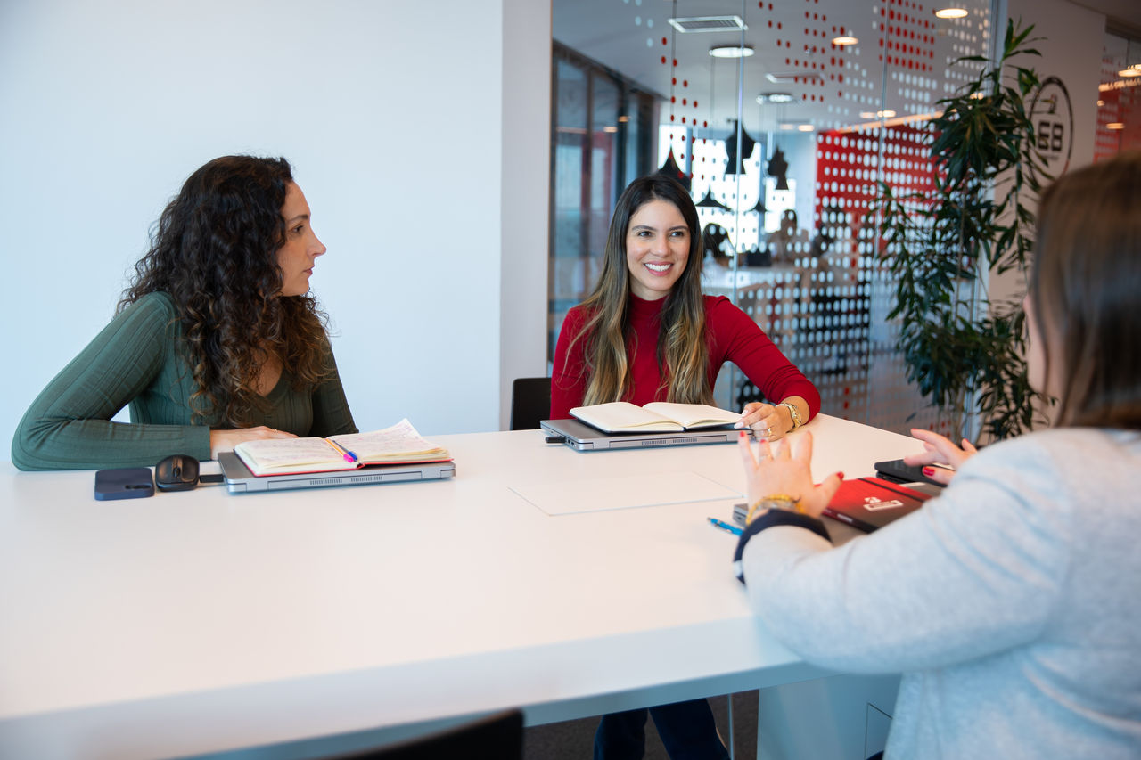 a group of women sitting at a table