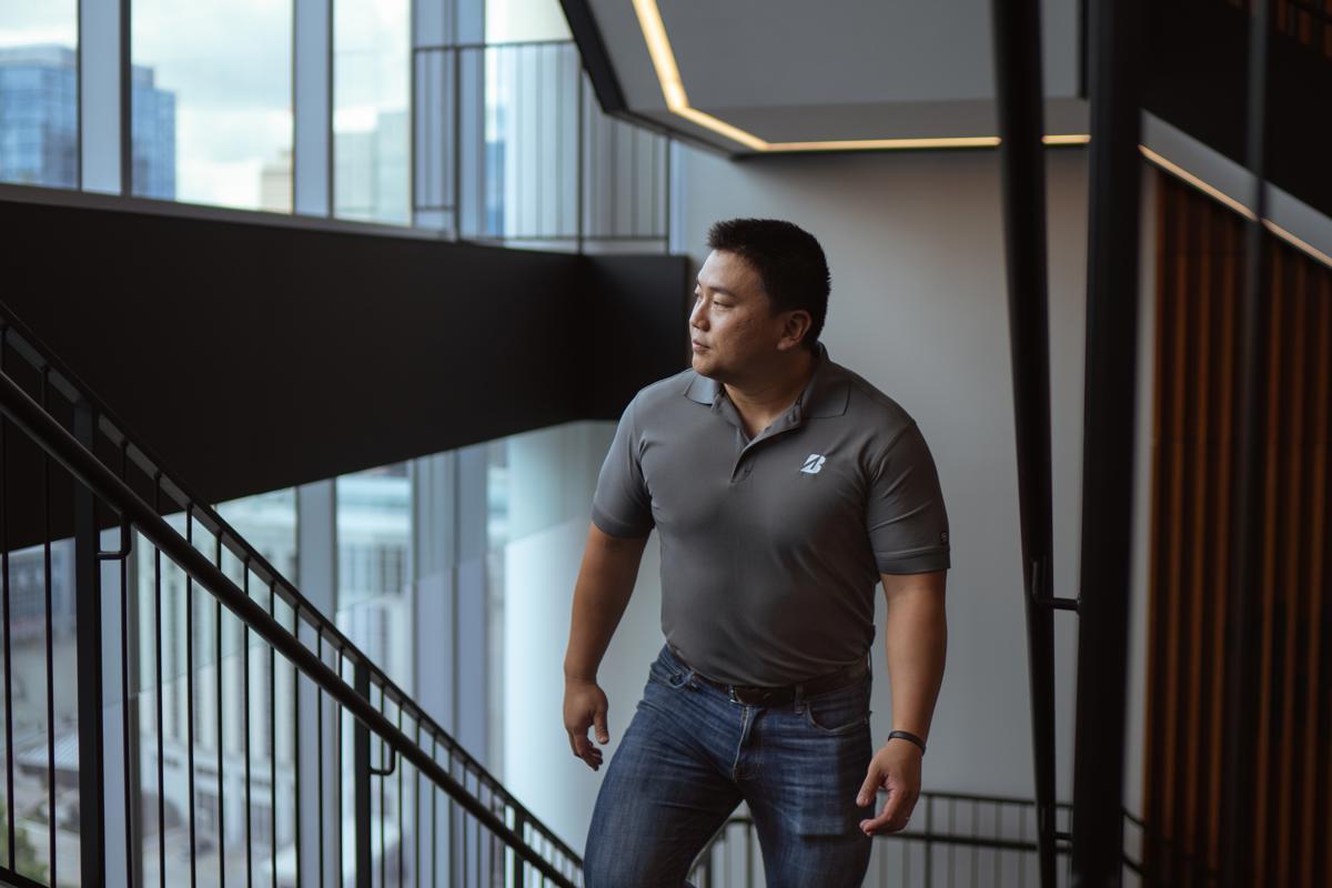 a man walking up a staircase