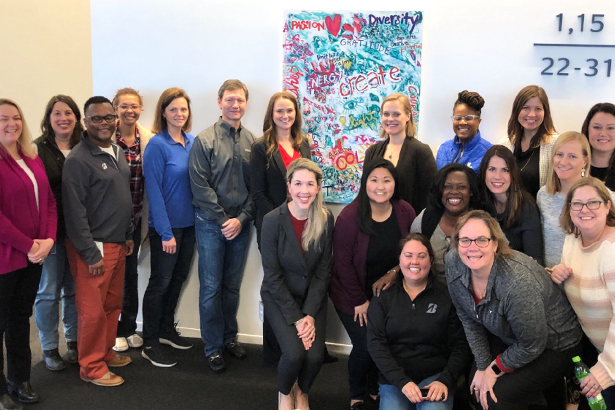 a group of people posing for a photo