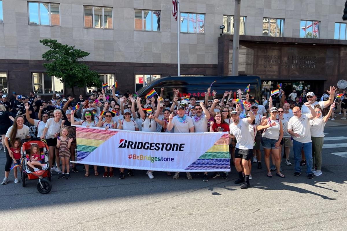 a group of people holding a banner