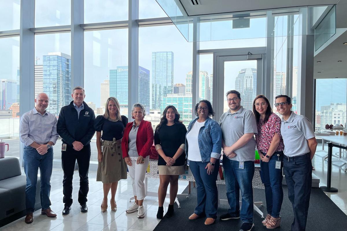 a group of people posing for a photo