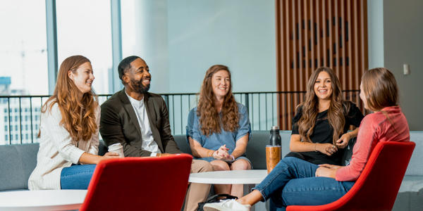 a group of people sitting in a circle