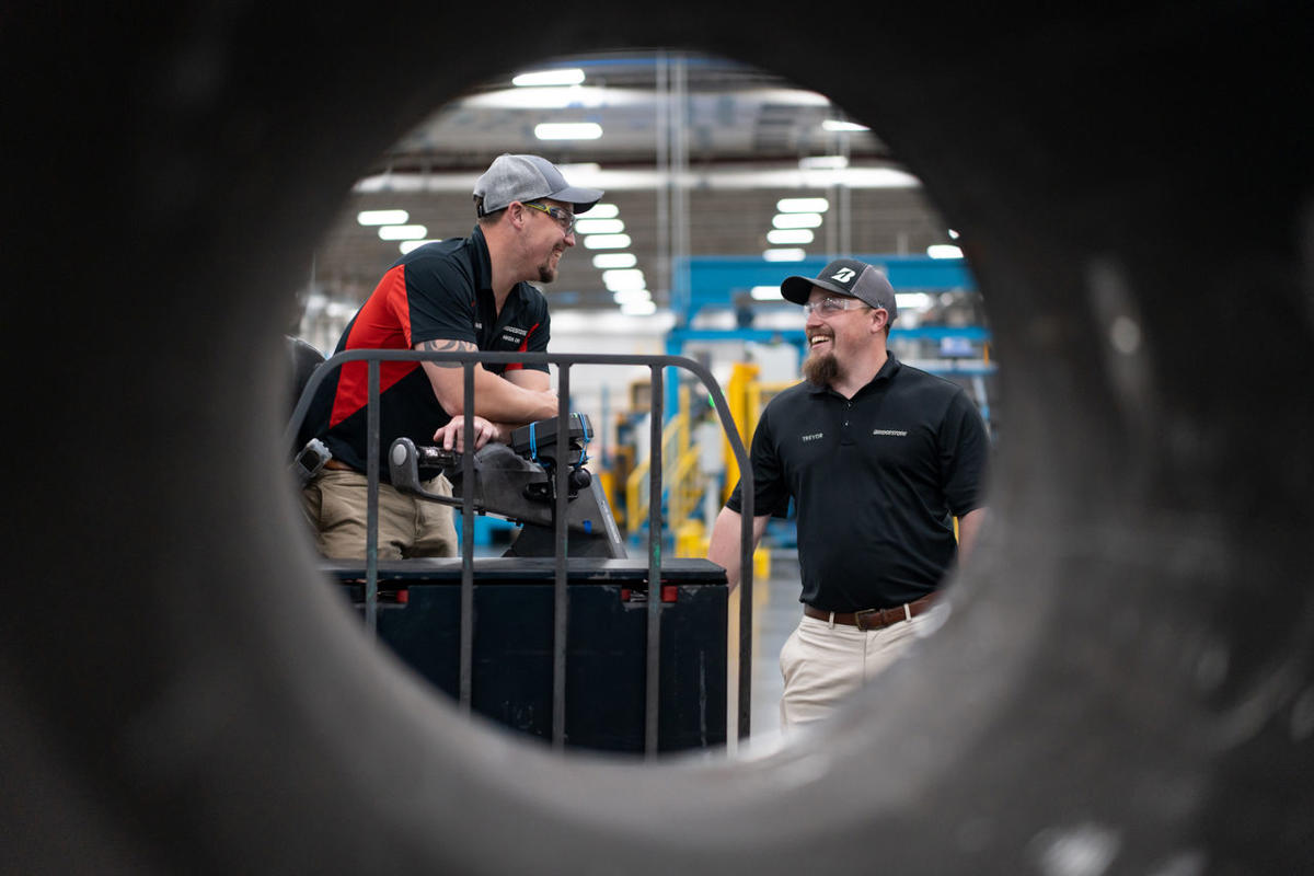a group of men in a factory