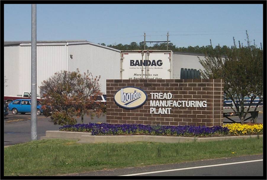 a sign on a brick wall