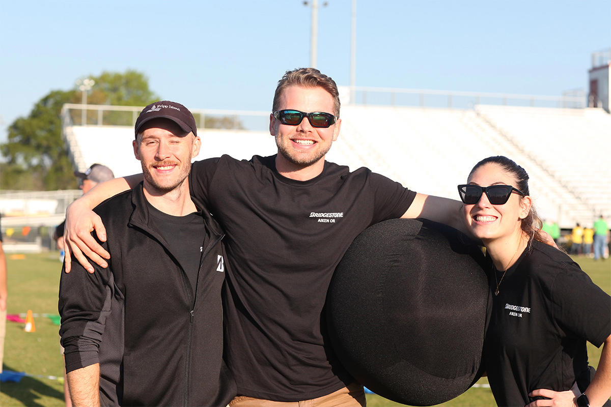 a group of people posing for a picture