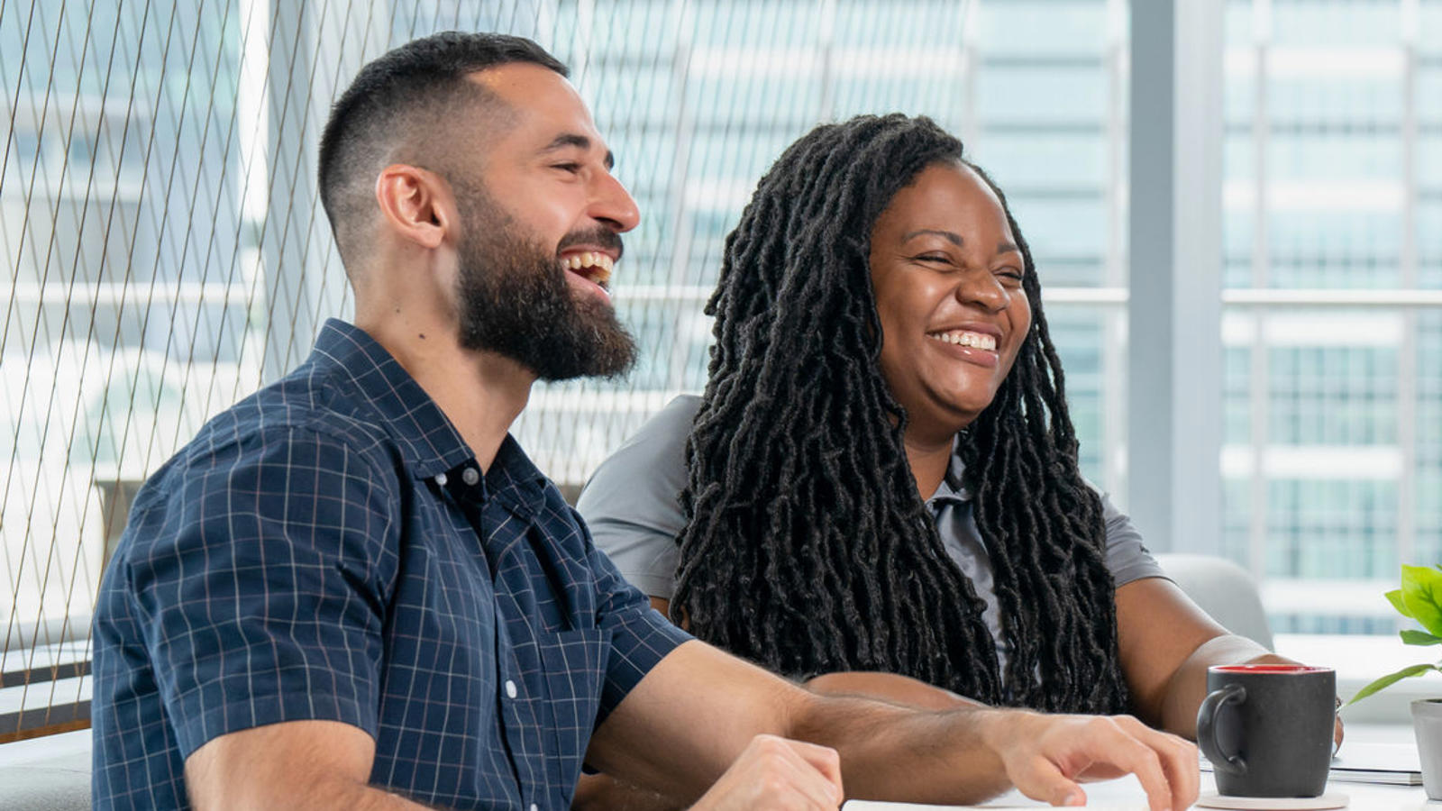 a group of people sitting at a table