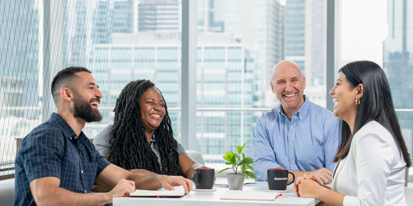 a group of people sitting at a table