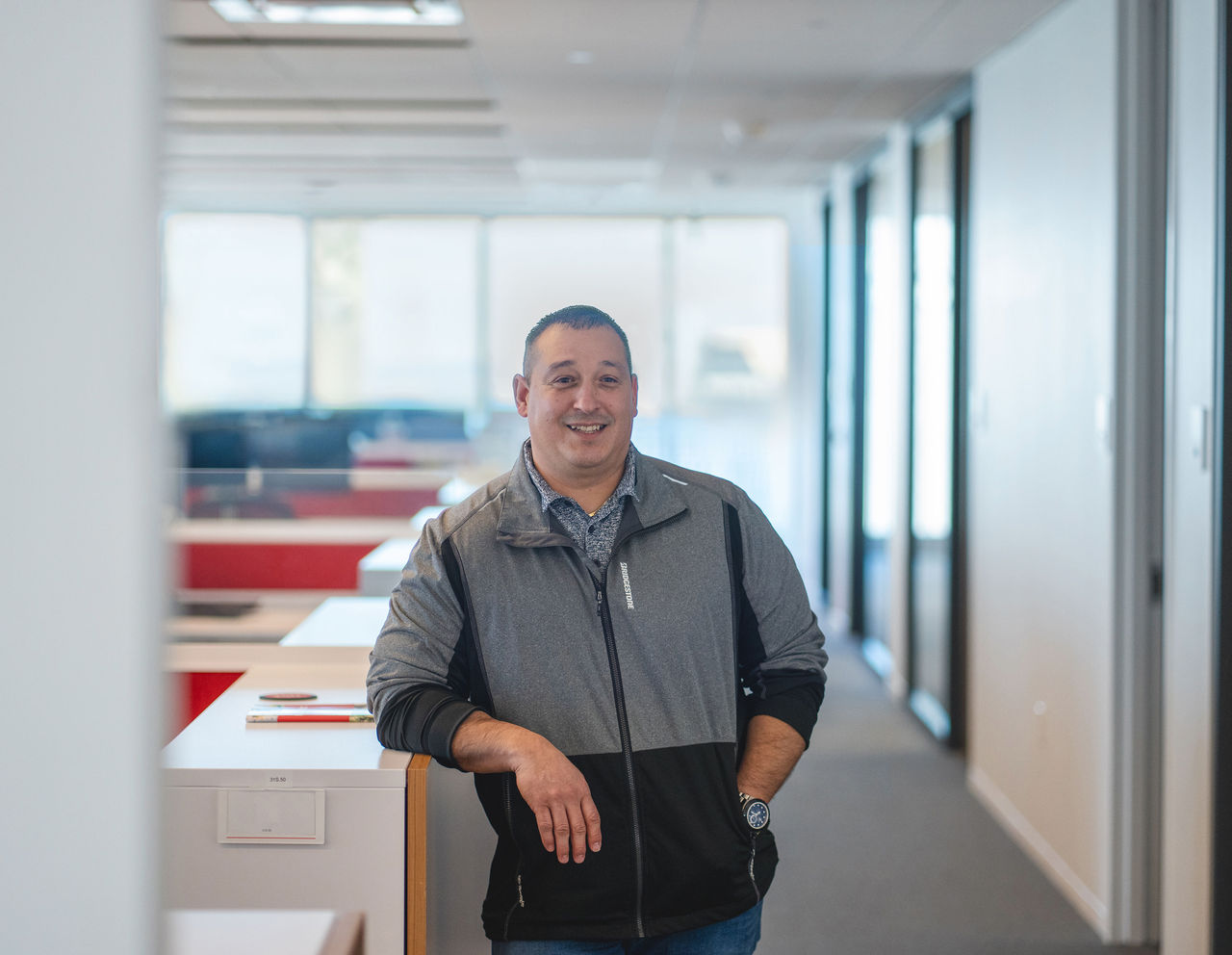 a man standing in an office